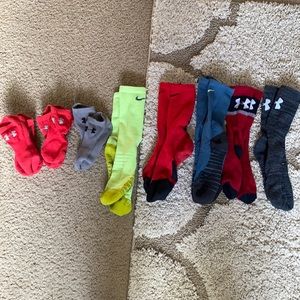 Assorted Nike and UA men’s socks.